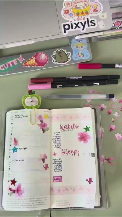 Pixyls sticker sheets in a journal