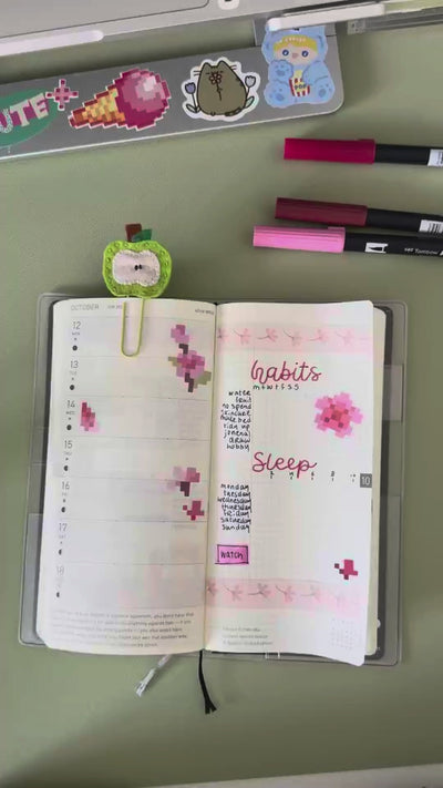 Pixyls sticker sheets in a journal